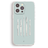 a phone case with a design of five different types of surgical tools, including scissors, forceps, and clamps, arranged in a row.