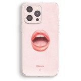a phone case with a pink background and a close-up of a red lips illustration.