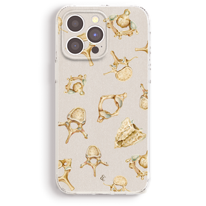 a phone case with a repeating pattern of various skull and vertebrae illustrations.