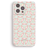 a clear phone case with a pink and green floral pattern.