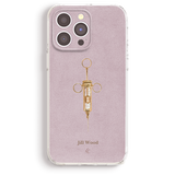 a pink phone case with a gold syringe design on it.