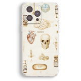 a phone case with a medical theme, including illustrations of a brain, heart, skull, syringe, and various medical equipment.